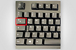 Bild einer Tastatur mit markierter Tabulator-Taste.