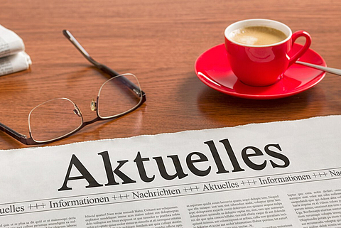 Zeitung auf Schreibtisch - Aktuelles