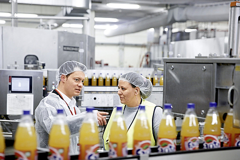 Sicherheitsgespräch zwischen Mitarbeiterin und Sicherheitsfachkraft